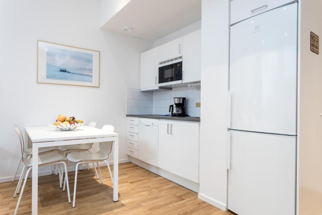 Kuchyň nebo kuchyňský kout v ubytování ApartDirect Sundbyberg