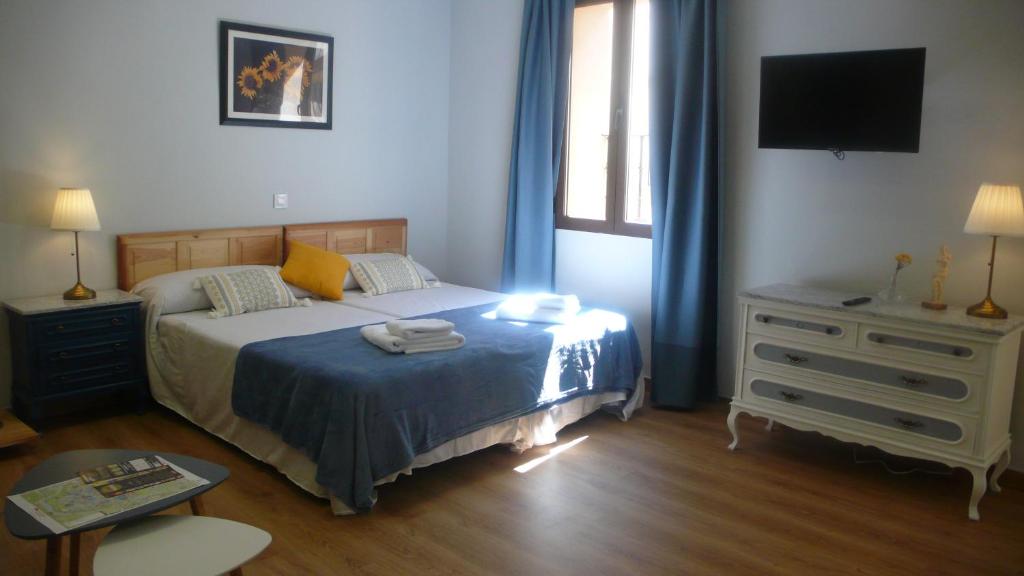 Posteľ alebo postele v izbe v ubytovaní Casa Armas A, en Zocodover, Casco Histórico