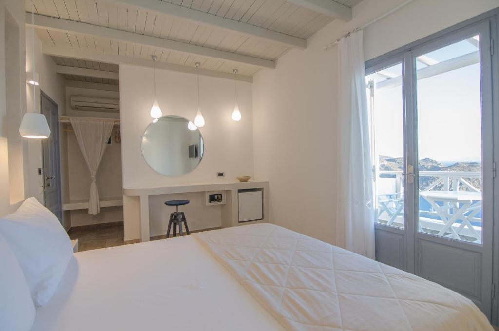 Postel nebo postele na pokoji v ubytování Hotel Katerina
