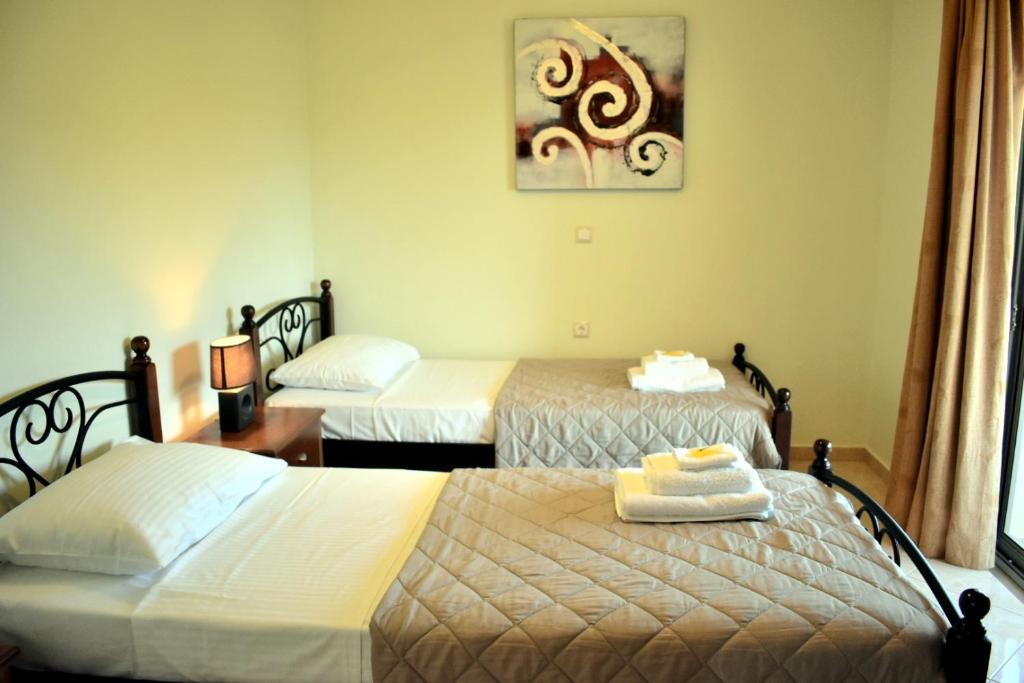 Posteľ alebo postele v izbe v ubytovaní Almyrida sea view house