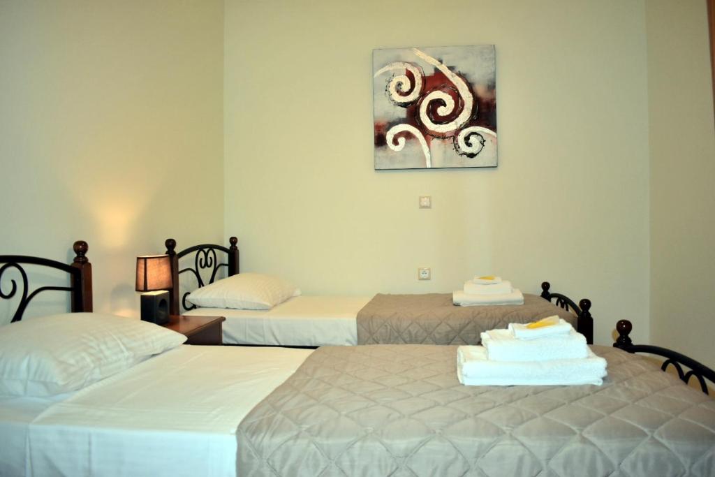Posteľ alebo postele v izbe v ubytovaní Almyrida sea view house