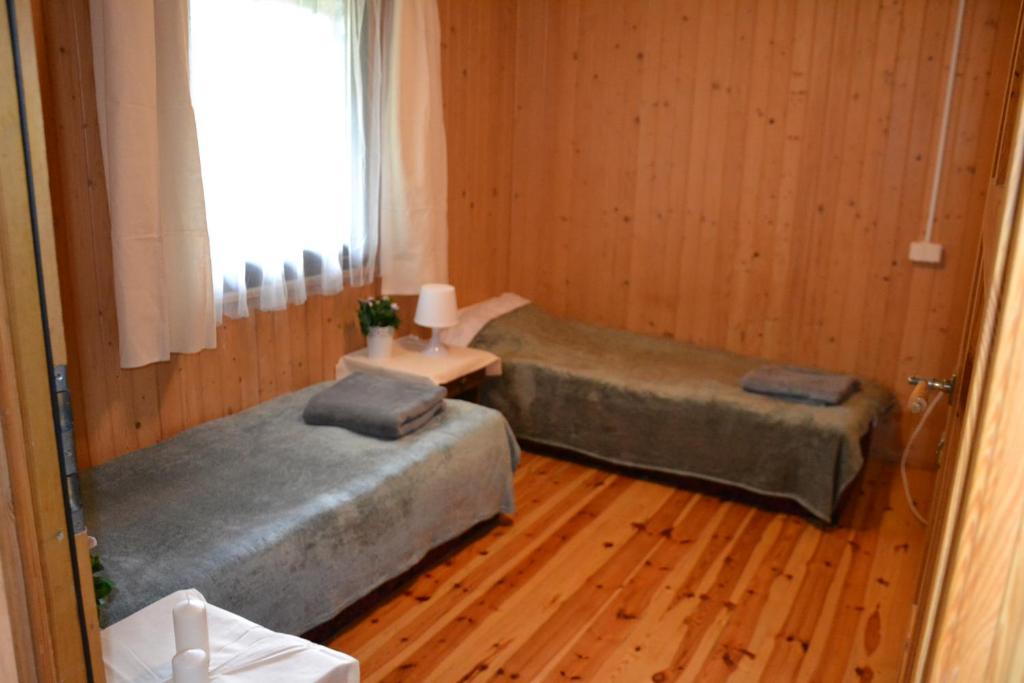 Posezení v ubytování Ośrodek leśny Rajsko w Zapuście