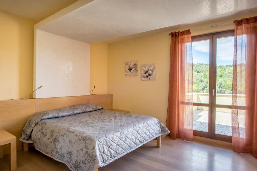 Postel nebo postele na pokoji v ubytování Valle Rosa