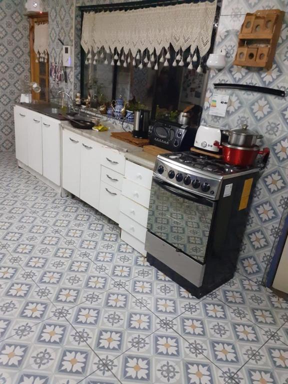 Kuchyň nebo kuchyňský kout v ubytování Hostal Boutique "Maryluz"