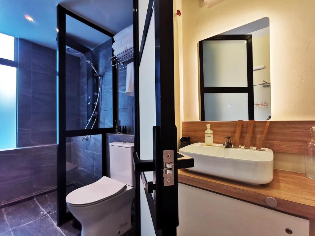 Koupelna v ubytování Oikos Poshtel
