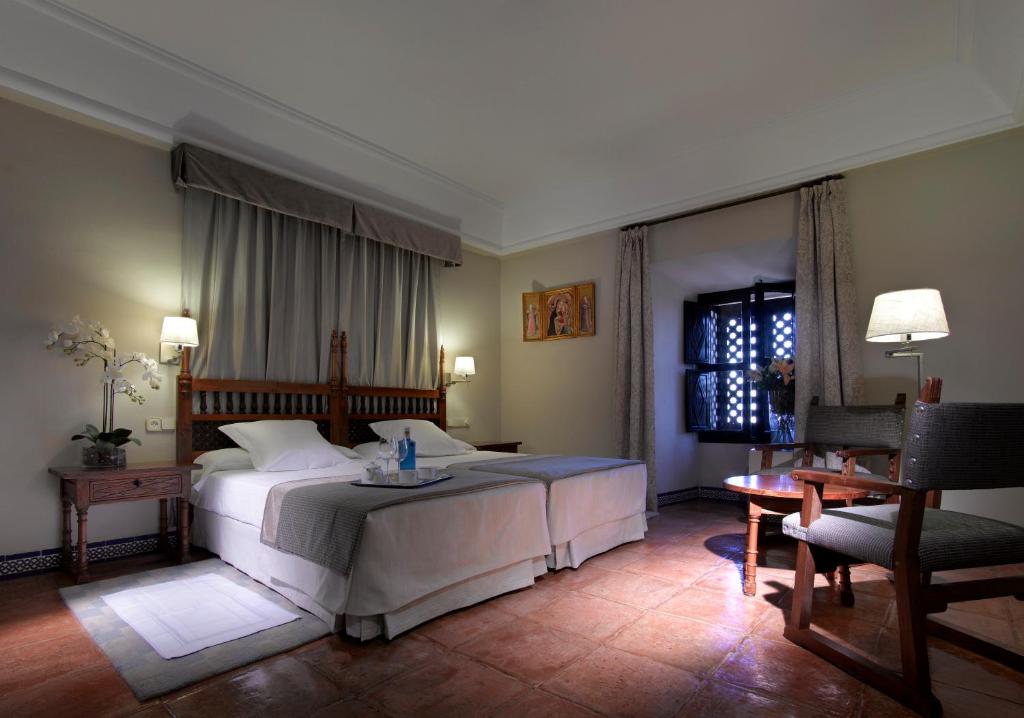 Posteľ alebo postele v izbe v ubytovaní Parador de Carmona