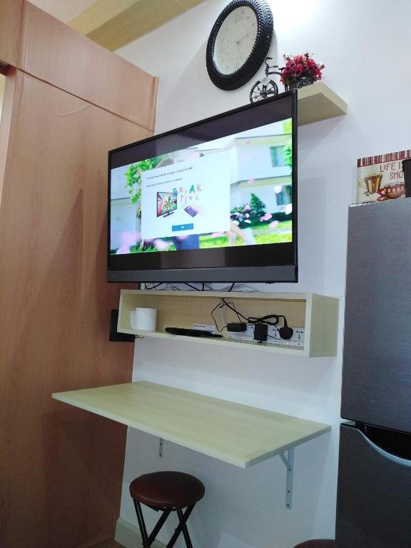 TV a/nebo společenská místnost v ubytování SMDC GRACE RESIDENCIES