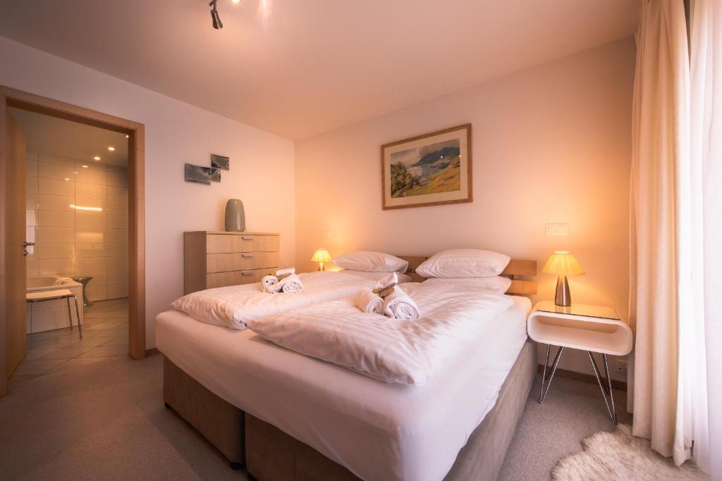 Postel nebo postele na pokoji v ubytování Chalet Bella Vista 4