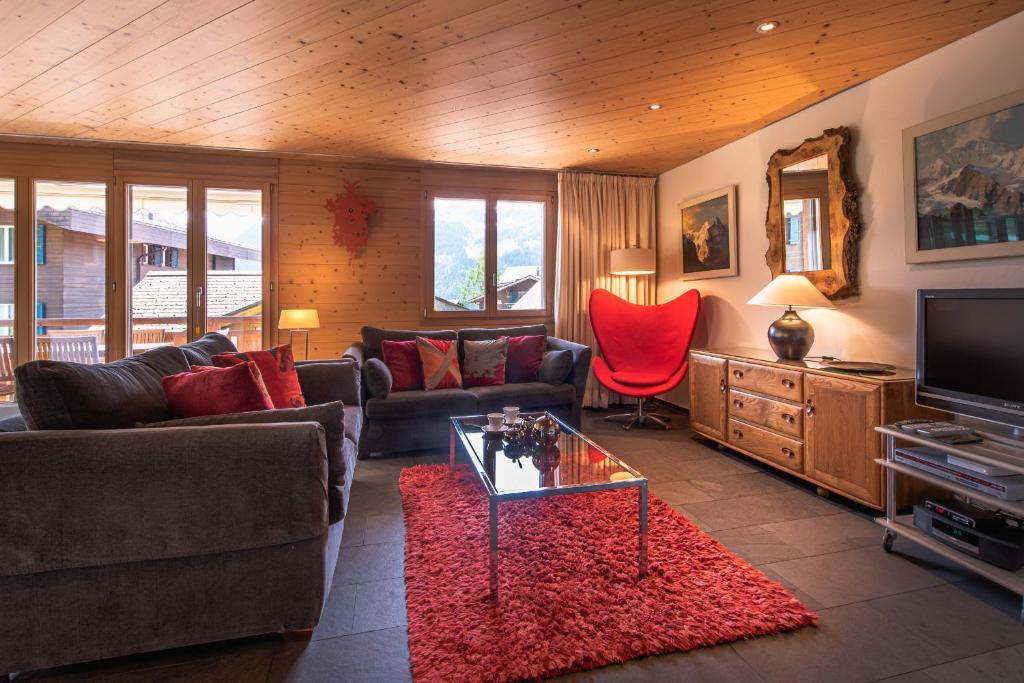 TV a/nebo společenská místnost v ubytování Chalet Bella Vista 4