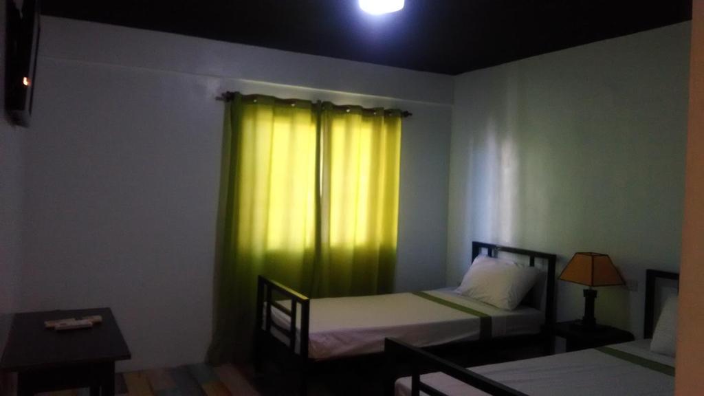 Postel nebo postele na pokoji v ubytování Lipa Bed & Breakfast