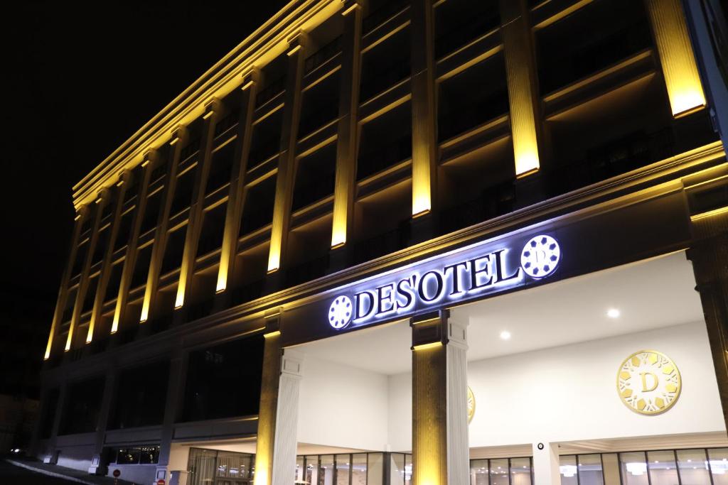 a building with a sign in front of it at DES'OTEL in Tekirdağ