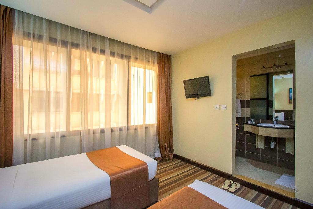 TV a/nebo společenská místnost v ubytování The Clarion Hotel