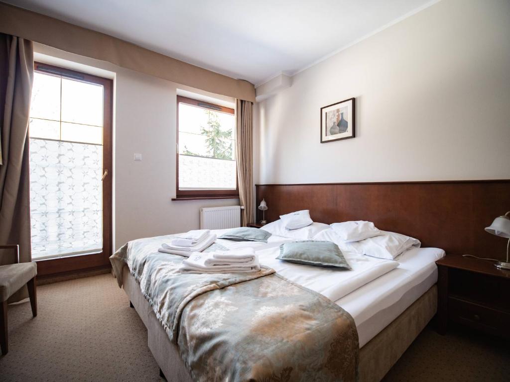 Posteľ alebo postele v izbe v ubytovaní Villa Wernera Hotel & Spa