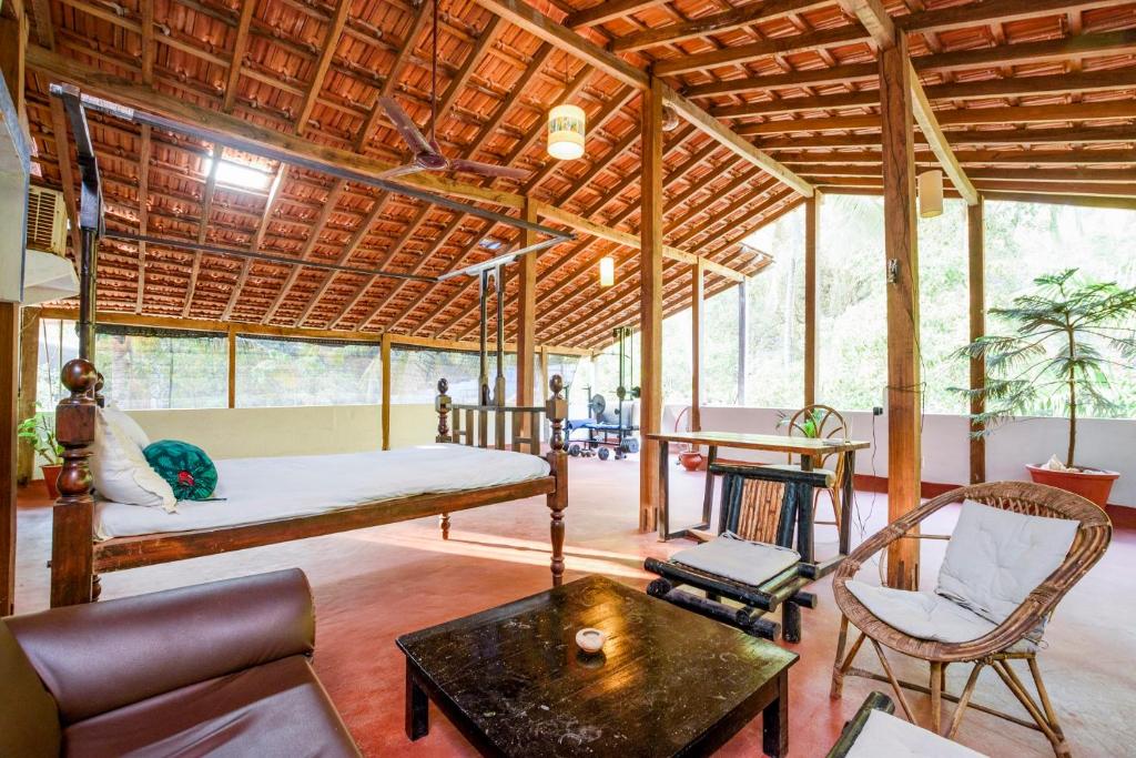 Posezení v ubytování Namaste Jungle - A Boutique Homestay