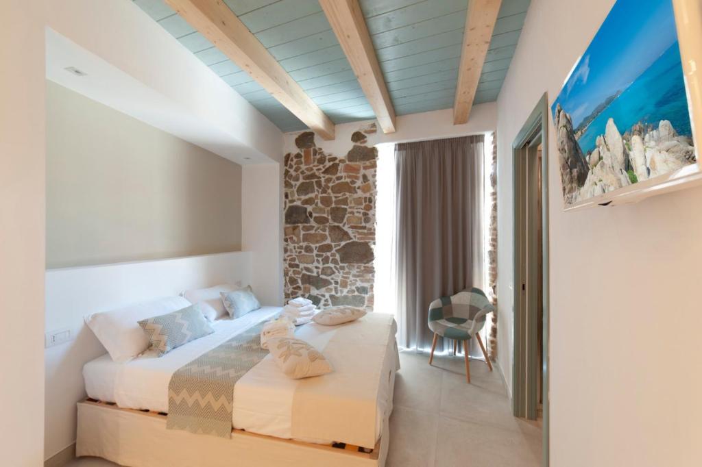 A bed or beds in a room at PERDAS ROOMS