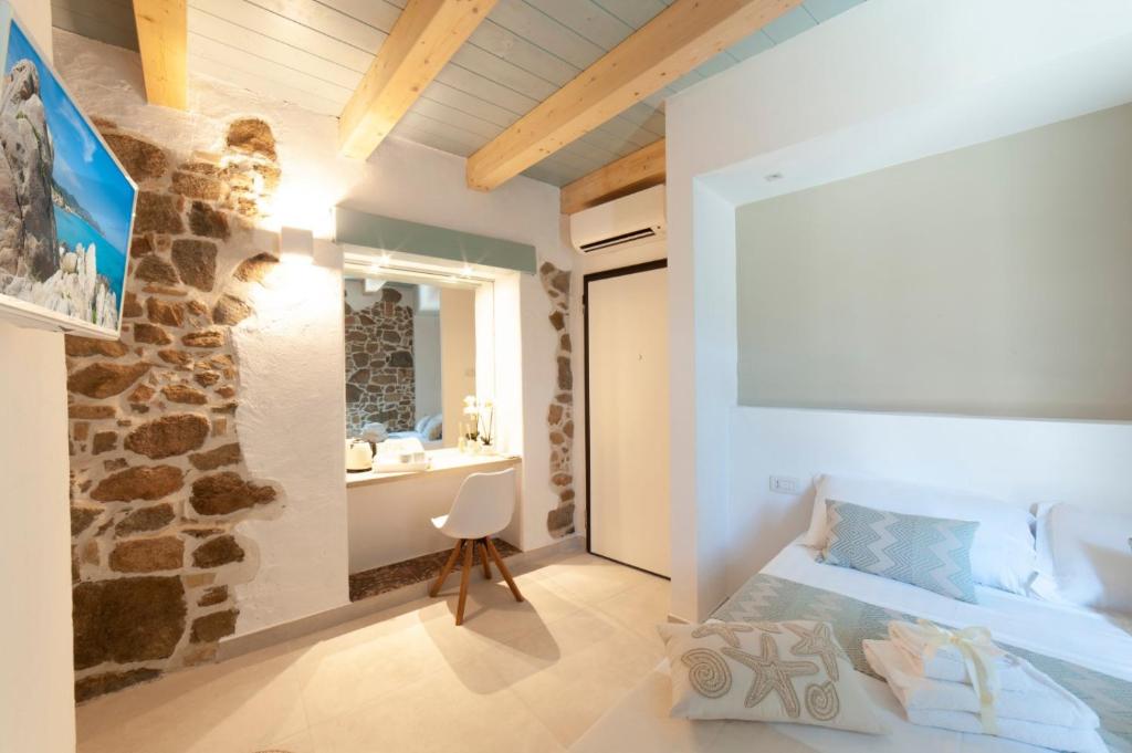A bed or beds in a room at PERDAS ROOMS
