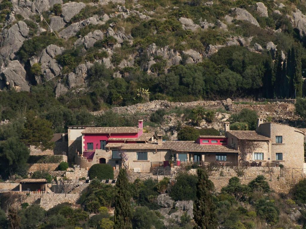 a house on the side of a mountain at SundanceMallorca in Port de Pollensa