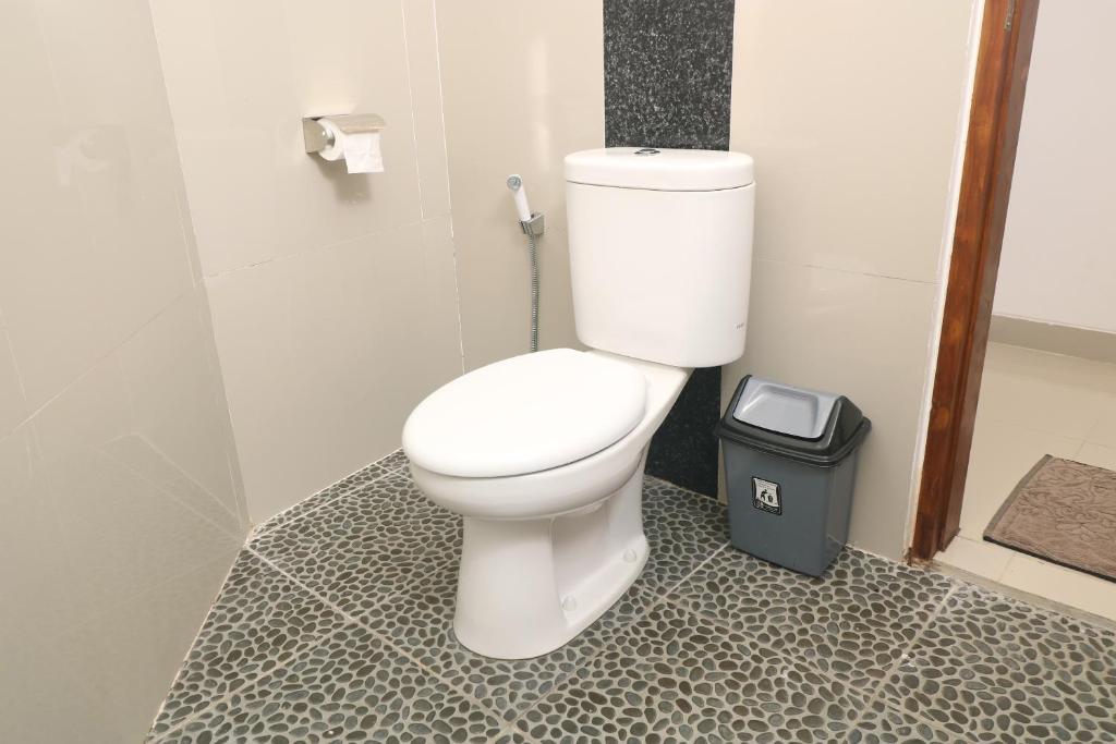 Koupelna v ubytování De Loran Hotel