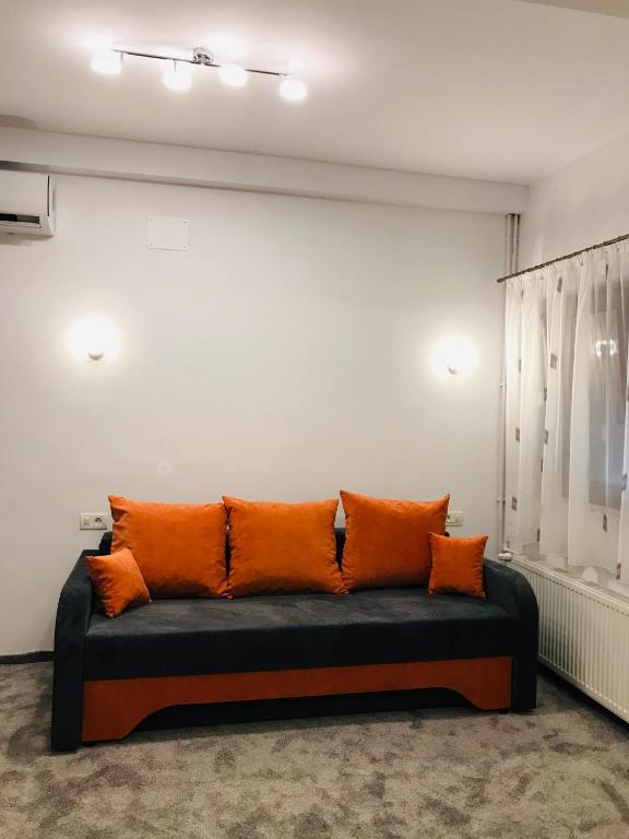 Posezení v ubytování Orange House Constanta