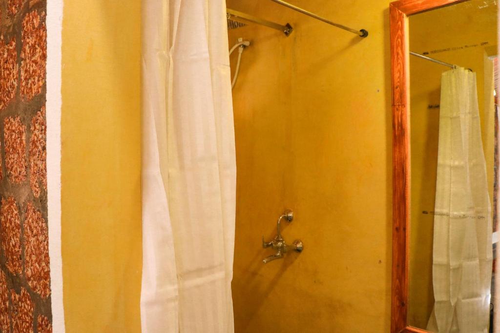 Koupelna v ubytování Namaste Jungle - A Boutique Homestay
