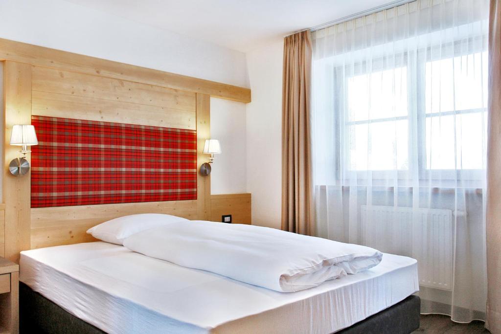 Posteľ alebo postele v izbe v ubytovaní B&B La Tranquillitè