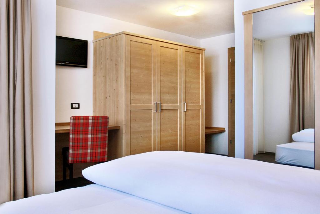 Posteľ alebo postele v izbe v ubytovaní B&B La Tranquillitè