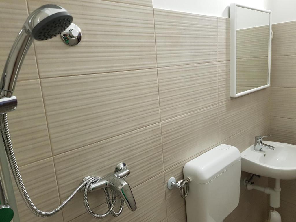 Koupelna v ubytování Guest House Nova