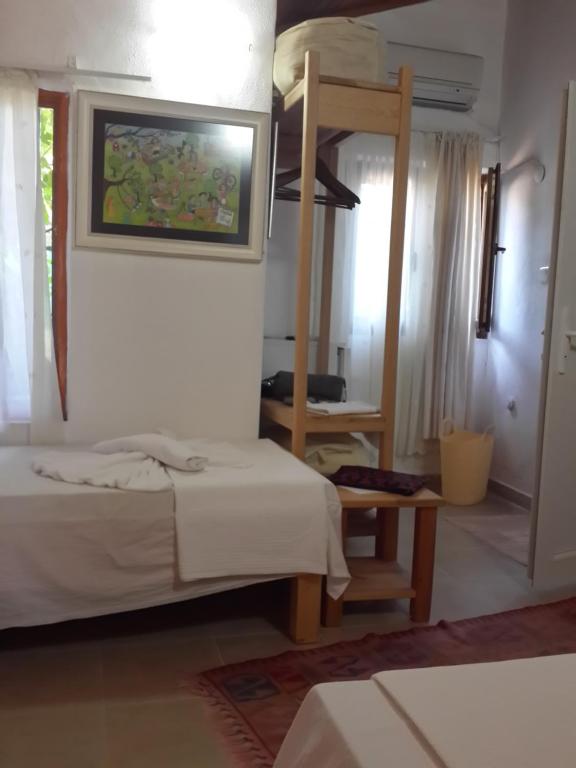 Postel nebo postele na pokoji v ubytování KUŞ YUVASI PANSiYON