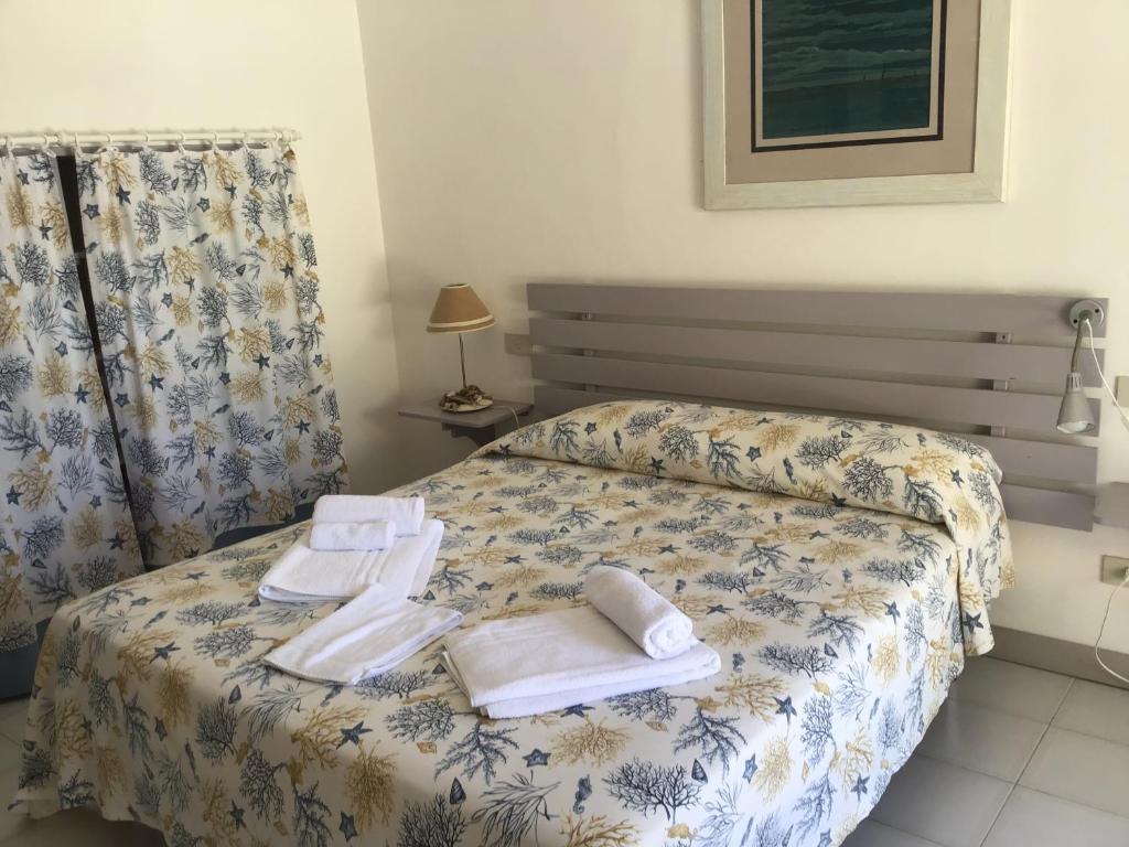 Postel nebo postele na pokoji v ubytování Villa Ghirardelli