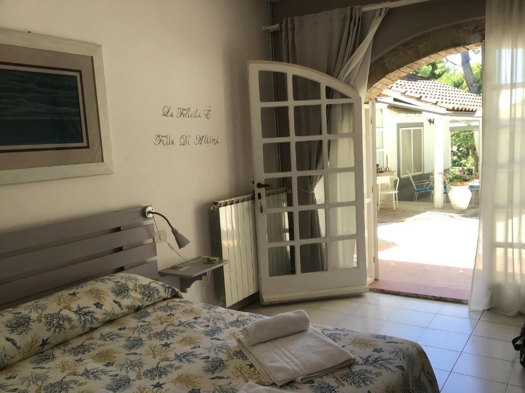 Postel nebo postele na pokoji v ubytování Villa Ghirardelli