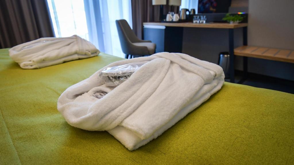 Postel nebo postele na pokoji v ubytování Hotel Olea