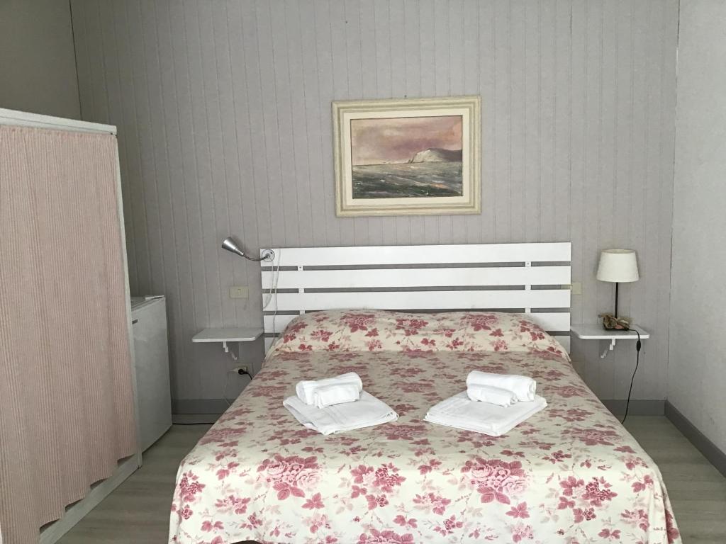 Postel nebo postele na pokoji v ubytování Villa Ghirardelli