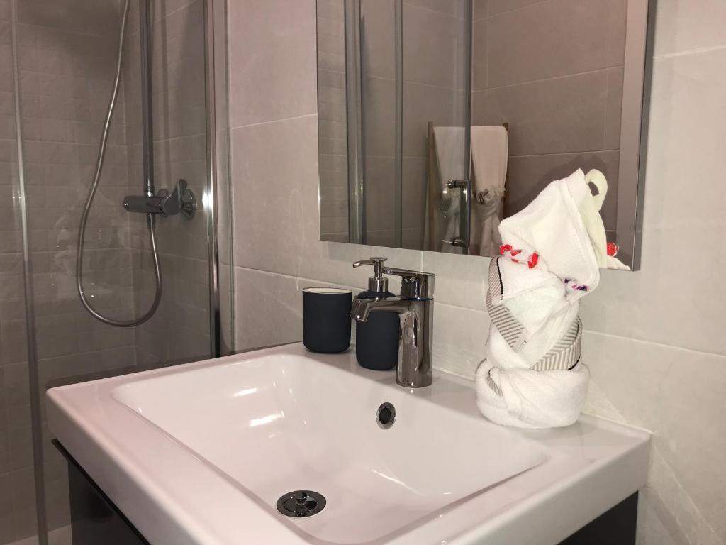 Koupelna v ubytování La Perla Apartment BY NAMASTE ELITE