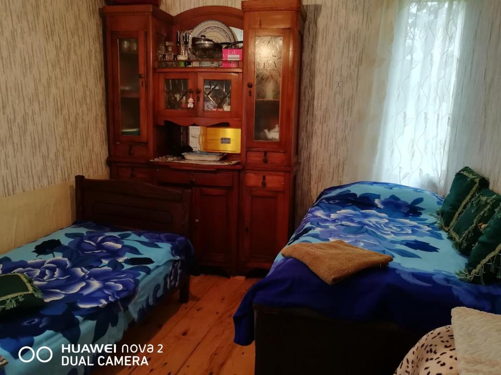 Postel nebo postele na pokoji v ubytování Nora's guesthouse