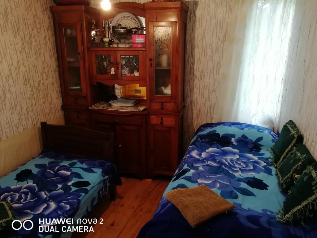 Postel nebo postele na pokoji v ubytování Nora's guesthouse