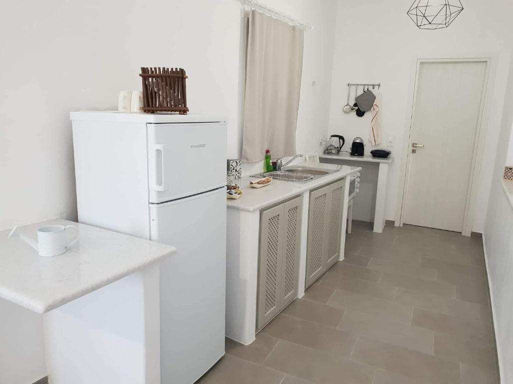 Kuchyň nebo kuchyňský kout v ubytování SAND & WAVES HOUSE
