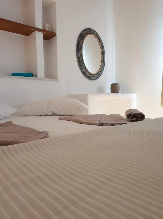 Postel nebo postele na pokoji v ubytování SAND & WAVES HOUSE