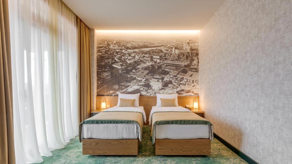 Postel nebo postele na pokoji v ubytování Sole Palace