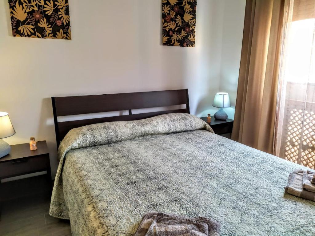 Postel nebo postele na pokoji v ubytování B&B Libellula
