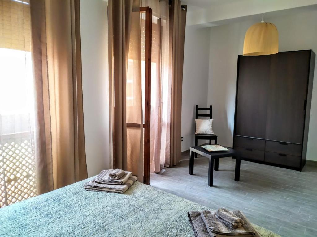 Postel nebo postele na pokoji v ubytování B&B Libellula