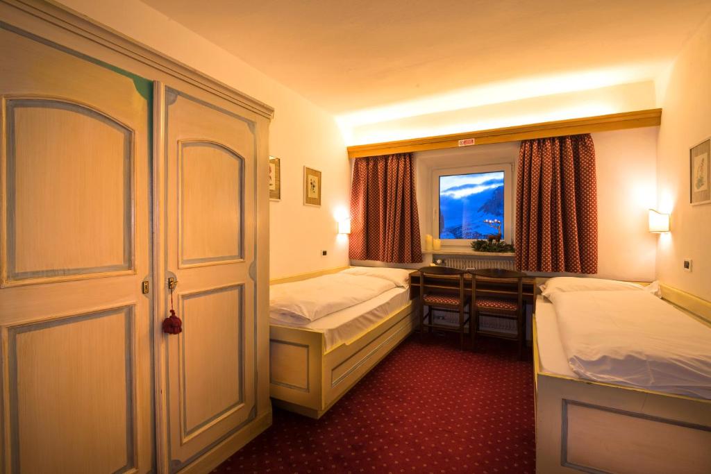 Postel nebo postele na pokoji v ubytování Hotel Cir