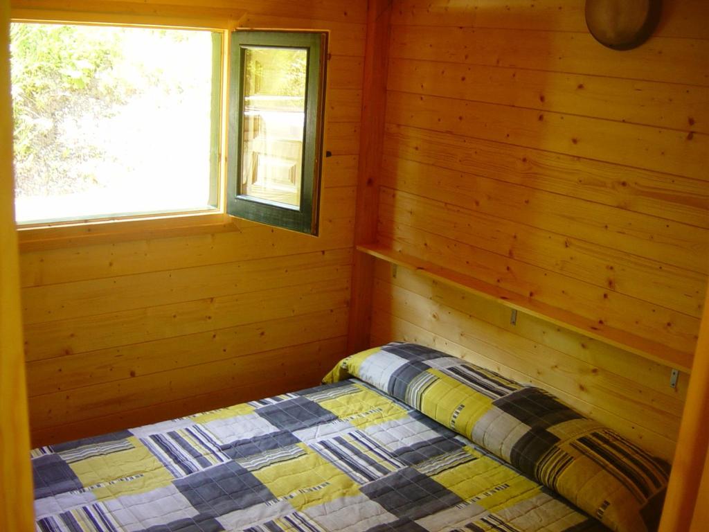 Postel nebo postele na pokoji v ubytování Camping Vall de Ribes