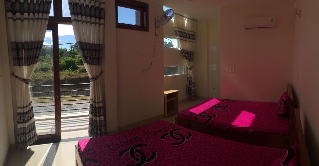 Postel nebo postele na pokoji v ubytování Gia Anh Guesthouse