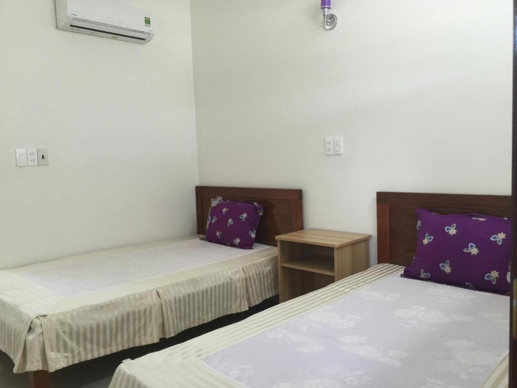 Postel nebo postele na pokoji v ubytování Gia Anh Guesthouse