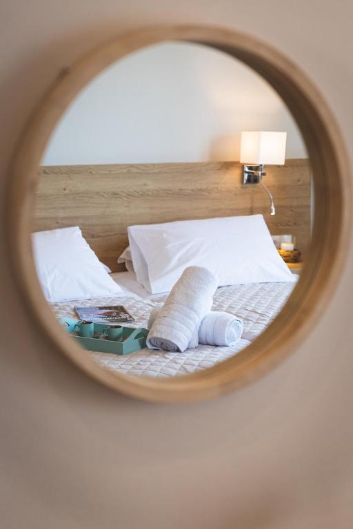 Postel nebo postele na pokoji v ubytování Euphoria Blue studio apartments