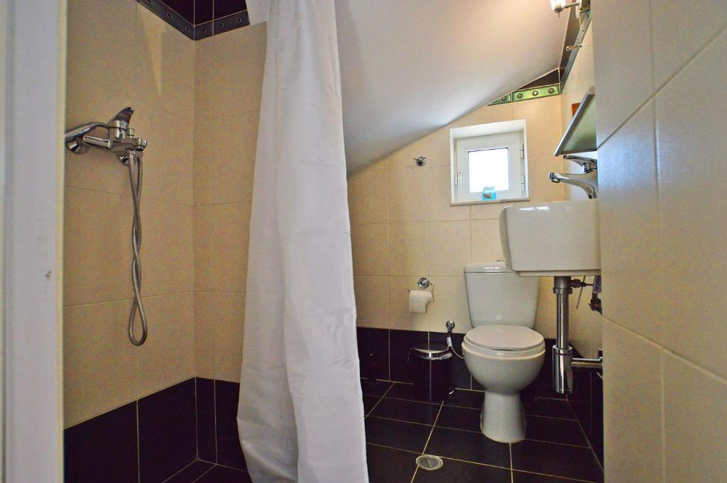 Koupelna v ubytování S-EVA RESORT