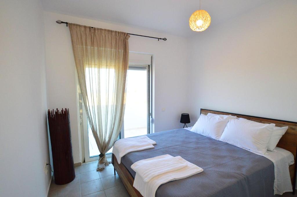 Postel nebo postele na pokoji v ubytování S-EVA RESORT