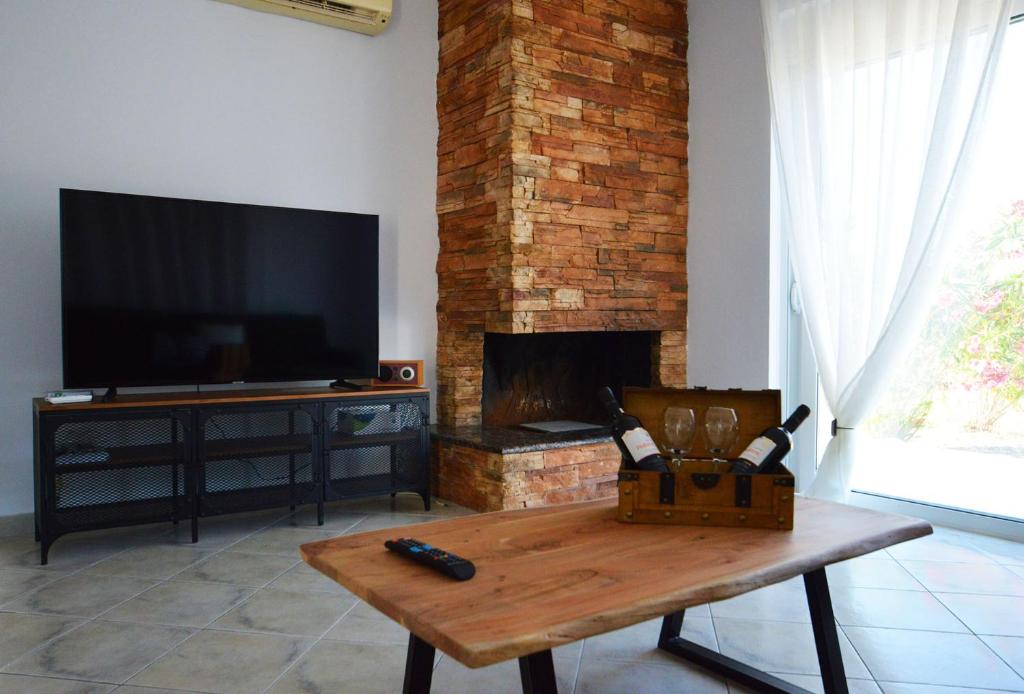 TV a/nebo společenská místnost v ubytování S-EVA RESORT