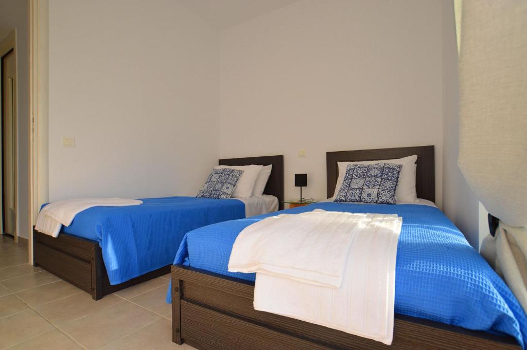 Postel nebo postele na pokoji v ubytování S-EVA RESORT