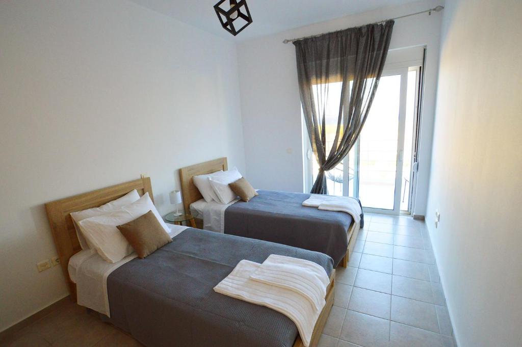 Postel nebo postele na pokoji v ubytování S-EVA RESORT
